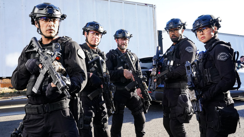 20-Squad pose together on "S.W.A.T."