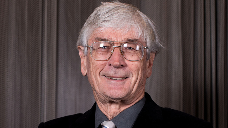 Dick Smith wearing glasses