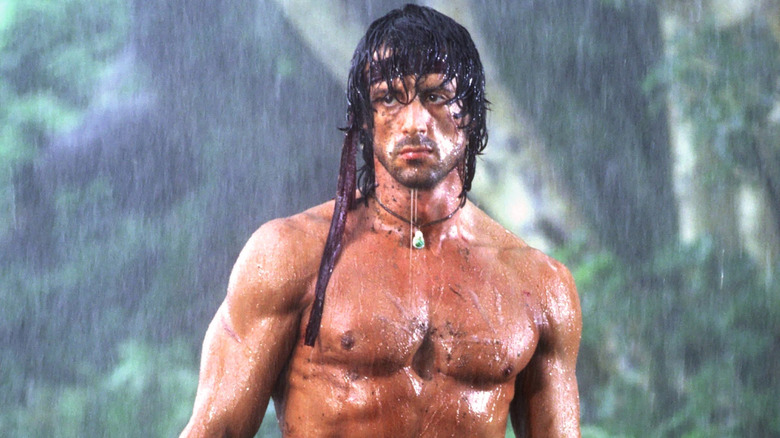 Rambo shirtless in rain