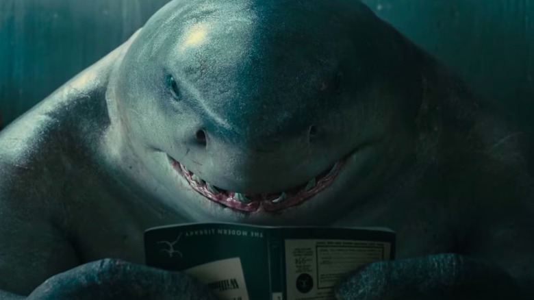 King Shark reading a book