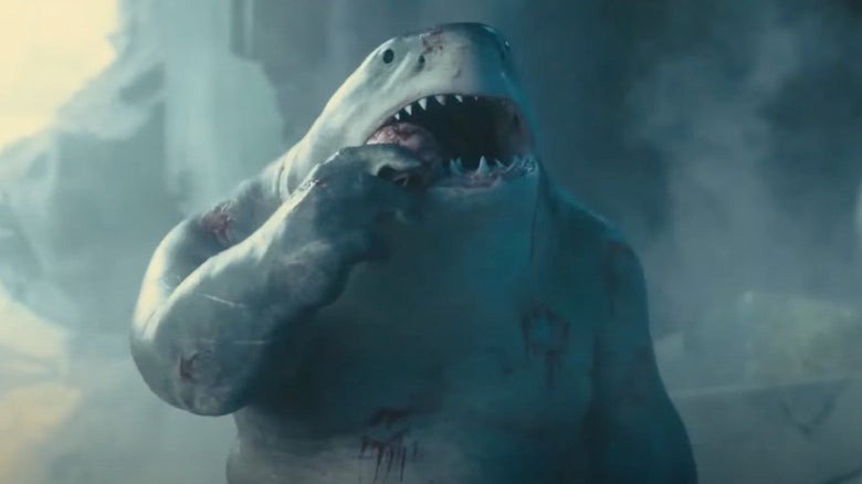 King Shark chewing a skull