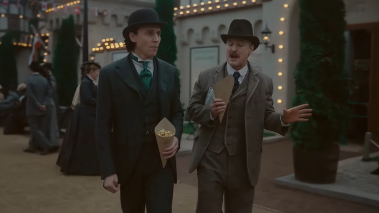 Loki Season 2's Tom Hiddleston and Owen Wilson eating popcorn at World's Fair