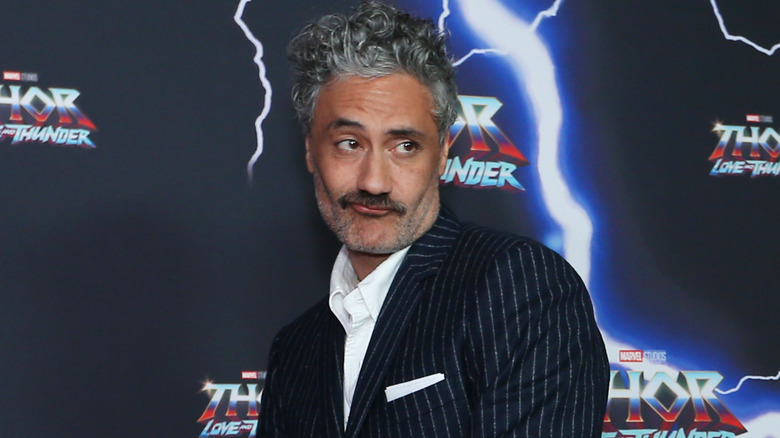 Taika Waititi smirks at the Thor: Love and Thunder Premiere in Sydney