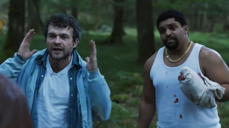 Cocaine Bear Alden Ehrenreich and O'Shea Jackson Jr. relaying a story