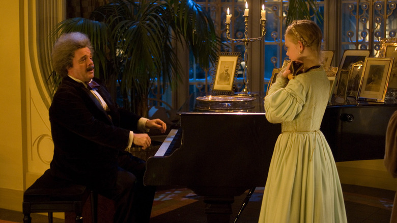 Uncle Albert playing the piano while Mary watches