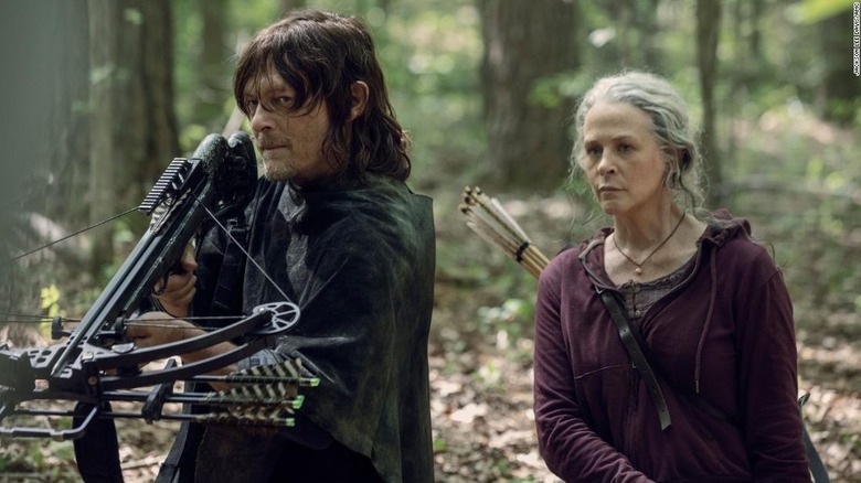 Daryl and Carol in woods