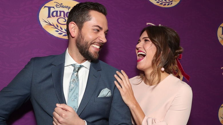 Zachary Levi and Mandy Moore smiling