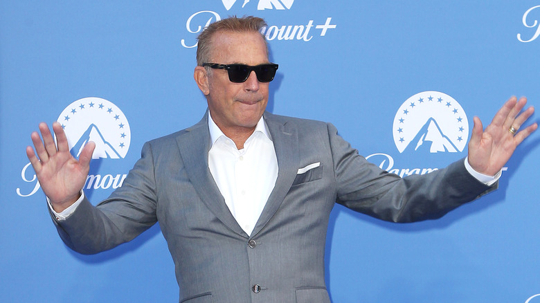 Kevin Costner waving