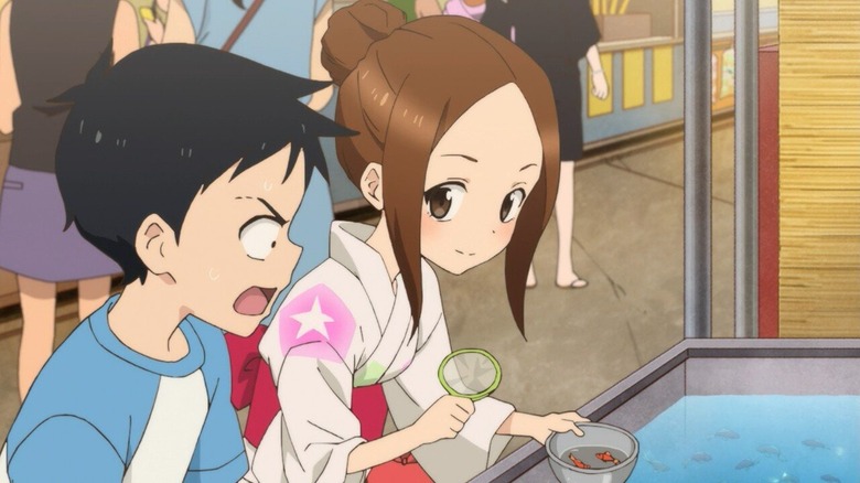 Takagi and Nijisaki with fish