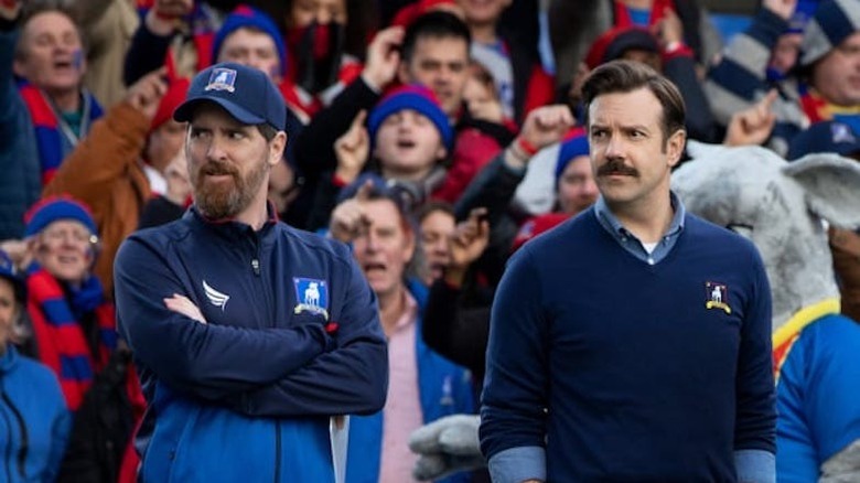 Coach Beard and Ted Lasso at soccer match