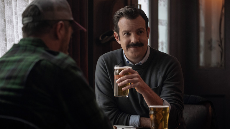 Ted Lasso drinks a beer