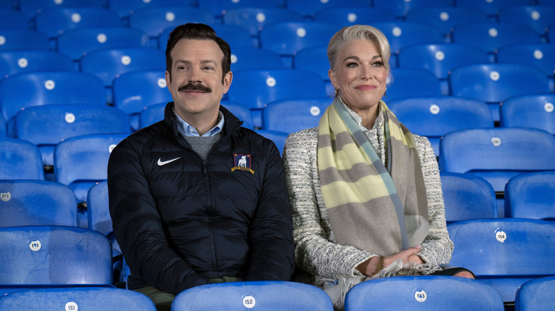 Ted and Rebecca sat in stadium