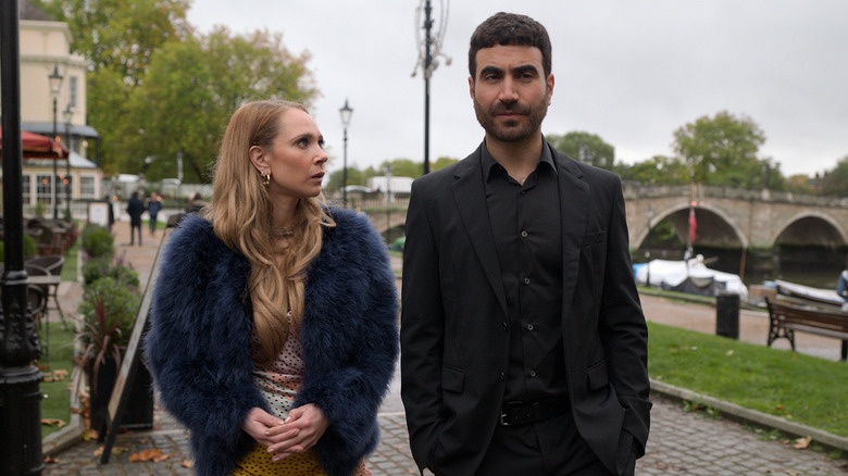 Roy Kent and Keeley Jones walking alongside a river