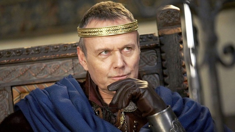 King Uther with a hand on his chin