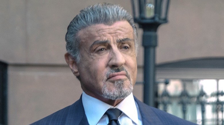 Sylvester Stallone looks away from camera in still from Tulsa King