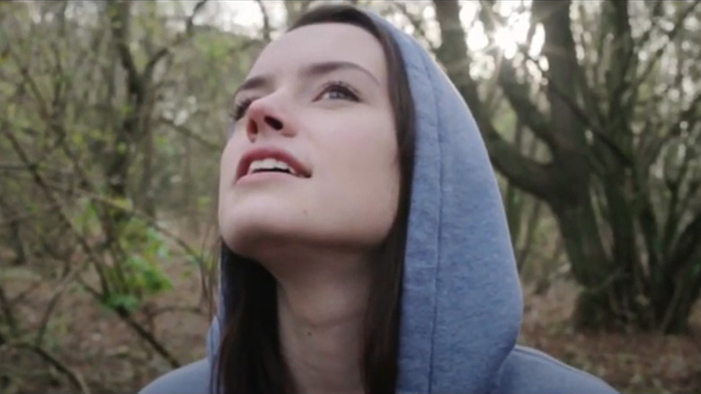 Daisy Ridley in the woods