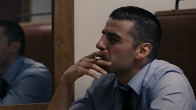 Oscar Isaac smoking