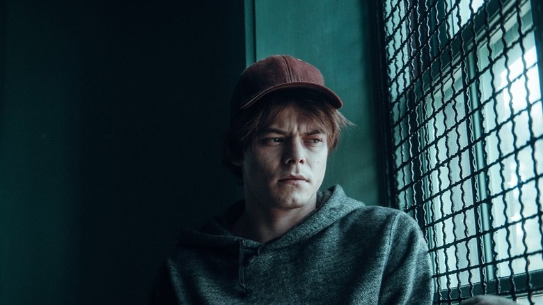 Charlie Heaton looking down