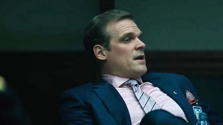 David Harbour leaning back