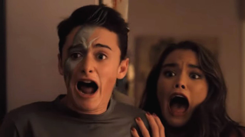 Noah Schnapp and Paris Berelc screaming