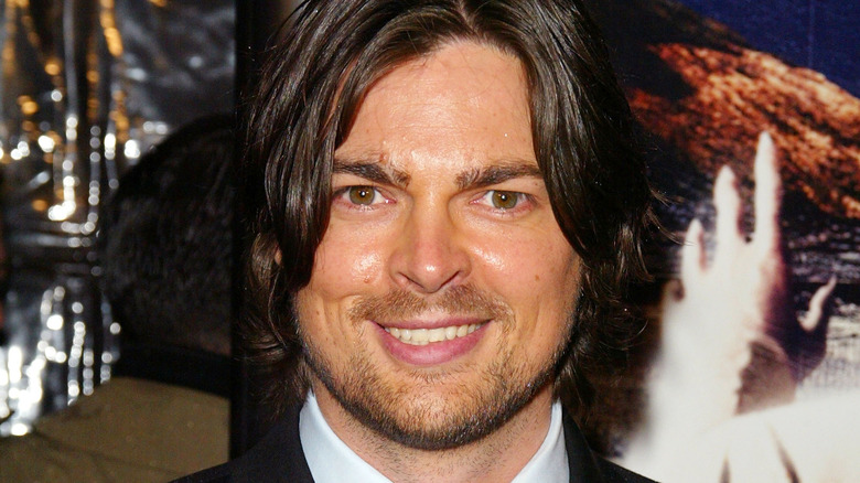 Clean-cut Karl Urban smiles