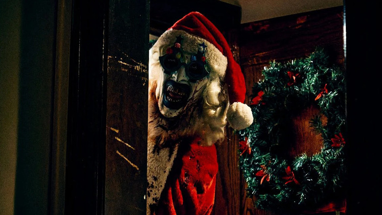 Art as Santa Claus peeking in door