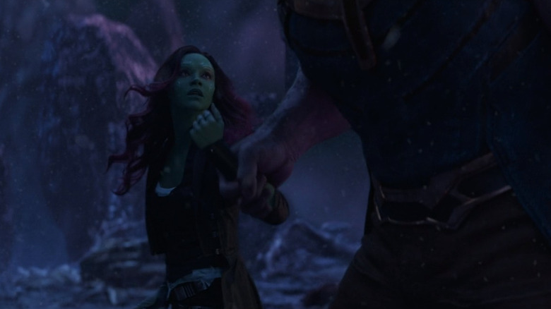 Thanos dragging Gamora