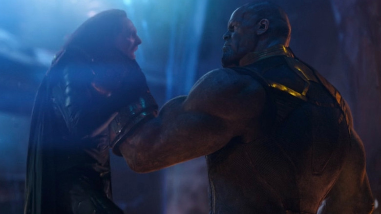 Thanos strangling Loki