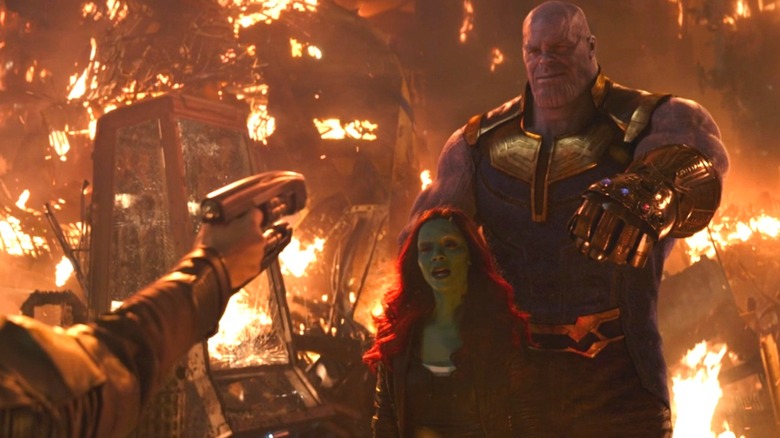 Thanos restraining Gamora