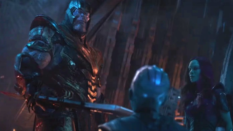 Nebula bowing down to Thanos