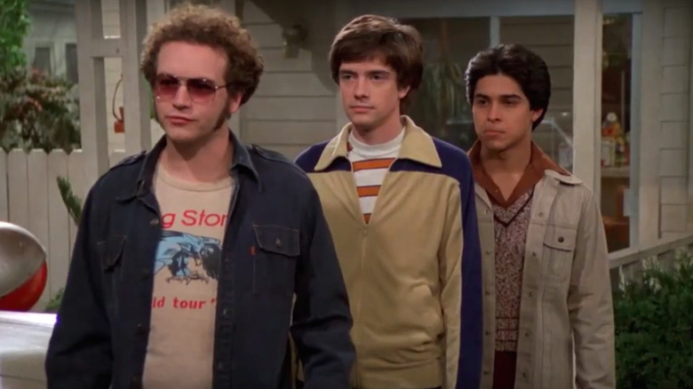 Hyde, Eric, and Fez look annoyed