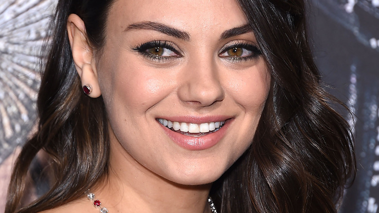 Mila Kunis smiling