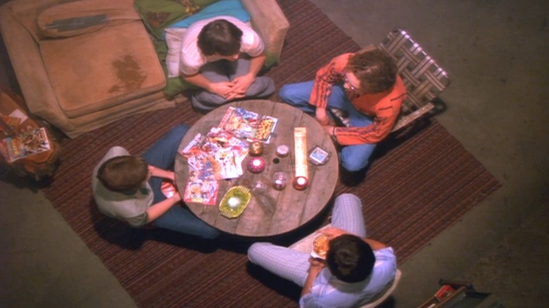 Kelso, Hyde, Fez, and Eric in circle