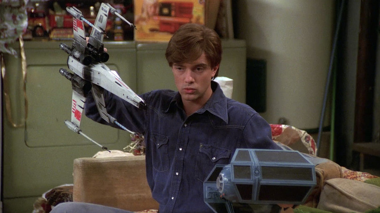 Eric Forman playing with Star Wars toys