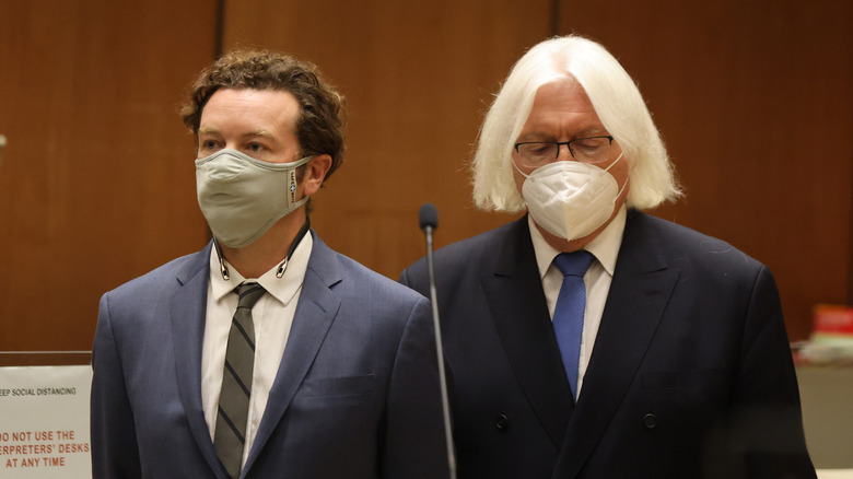 Danny Masterson stands with his lawyer Thomas Mesereau as he is arraigned on rape charges