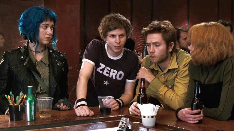 Ramona Scott Stephen and Kim standing at a bar in Scott Pilgrim vs. The World