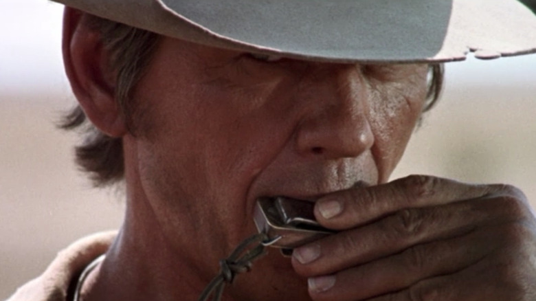 Bronson plays the harmonica Once Upon A Time In The West