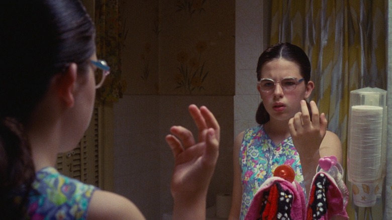 Dawn Wiener looks in the mirror in "Welcome to the Dollhouse" (1995)