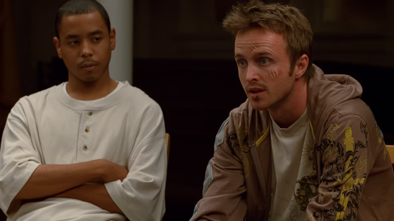 Jesse Pinkman stares ahead forlornly 