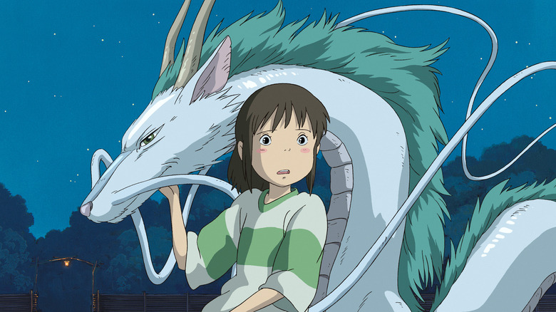 Chihiro with the dragon Haku in Spirited Away