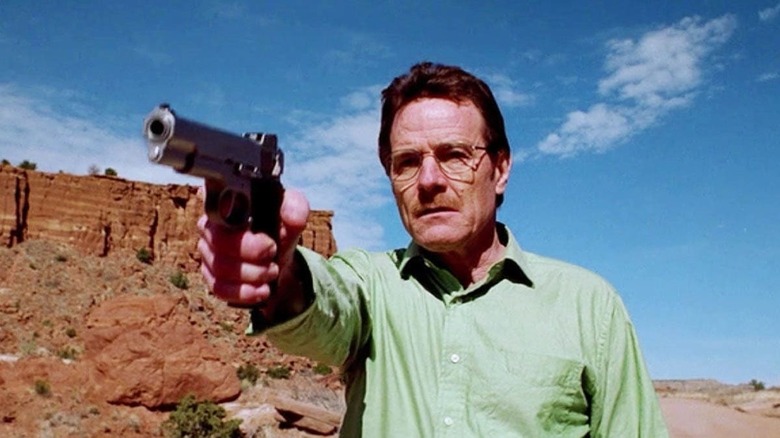 Walter White aims a gun