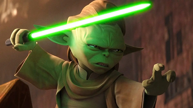 Yaddle wielding a green lightsaber