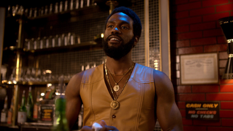 Clarence "Cadillac" Caldwell works behind a bar in "The Get Down" (2016-2017)