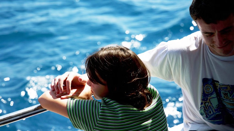 Calum and Sophie on a boat in "Aftersun"