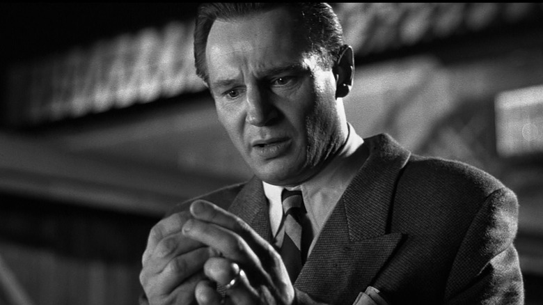 Oskar Schindler is overcome with grief in "Schindler's List"