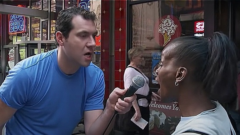 Billy Eichner arguing with a woman