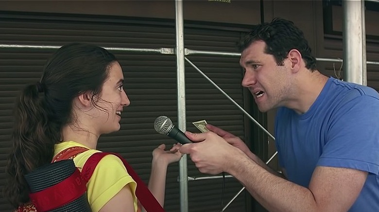 Billy Eichner with a young woman