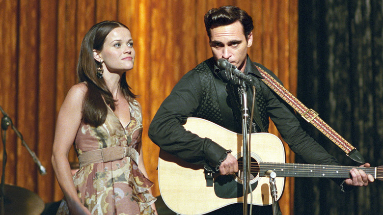 Johnny and June singing onstage in Walk the Line