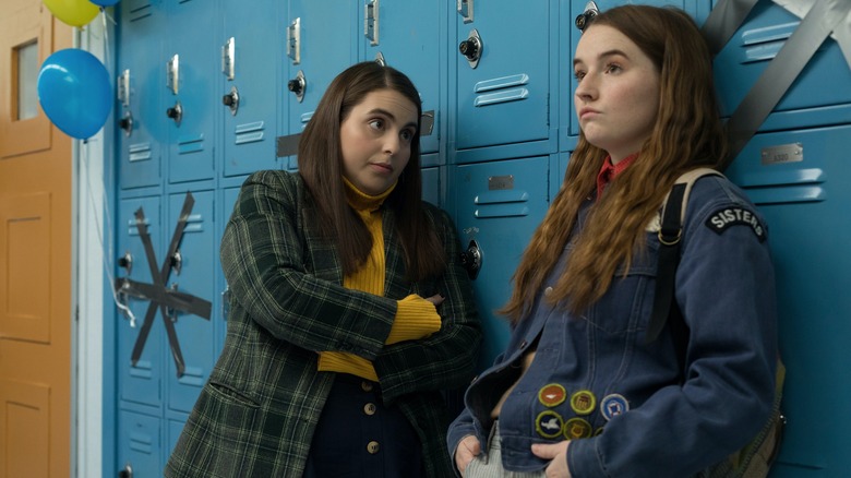 Kaitlyn Dever and Beanie Feldstein by lockers