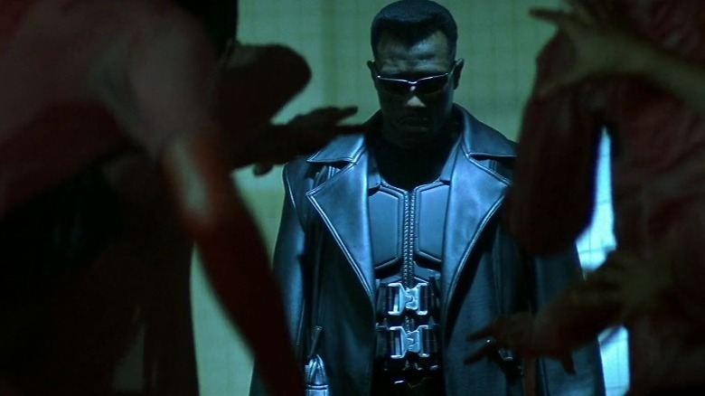 Blade surrounded by vampires